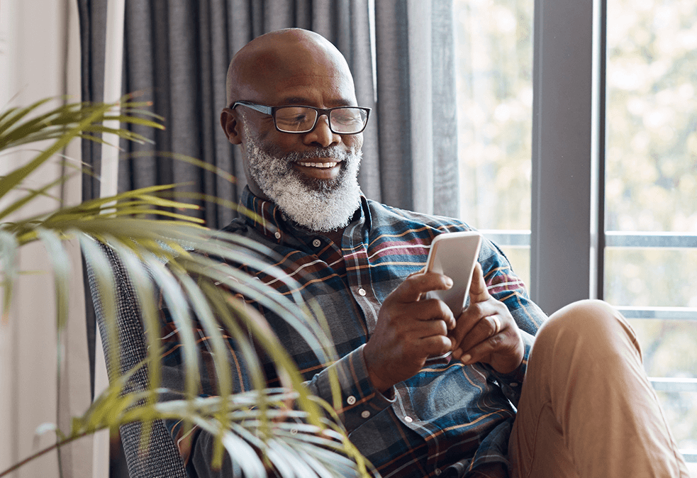 man using mobile phone for banking