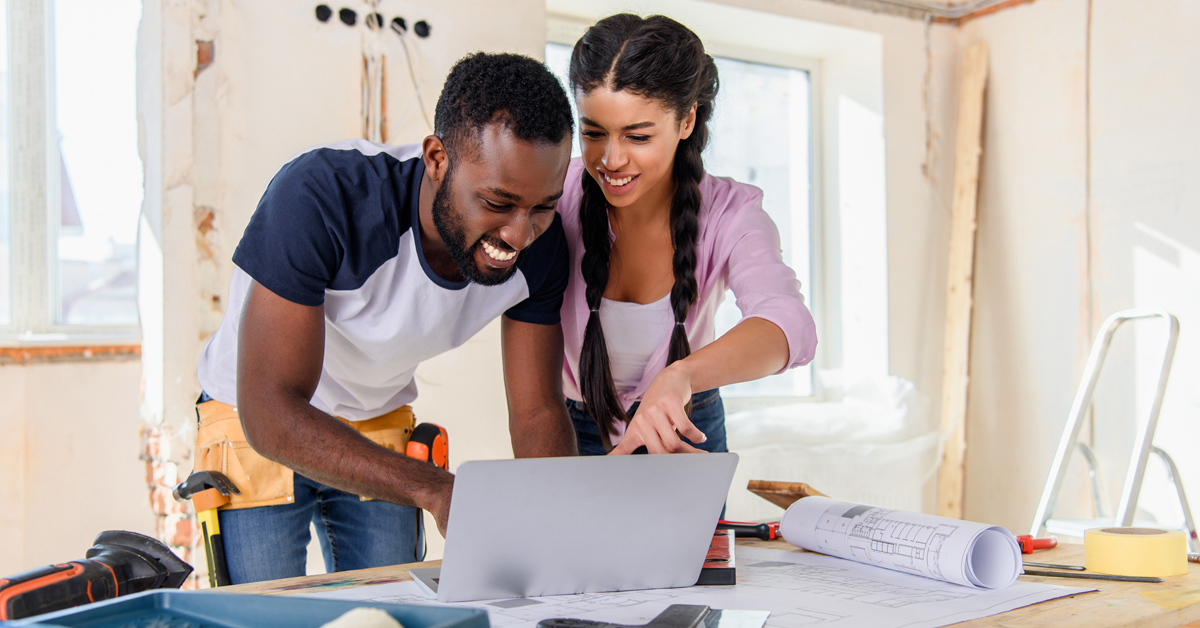 young couple working on home renovation project