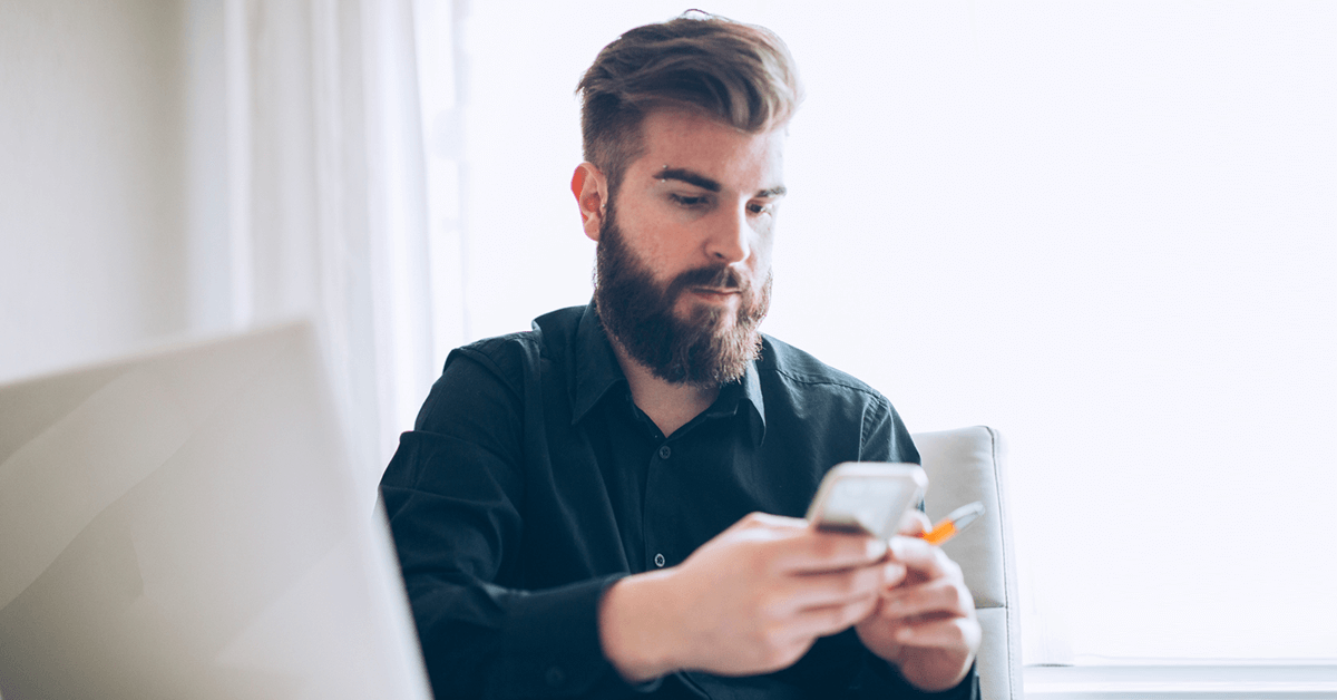 man using mobile app to get finances in order Thumbnail